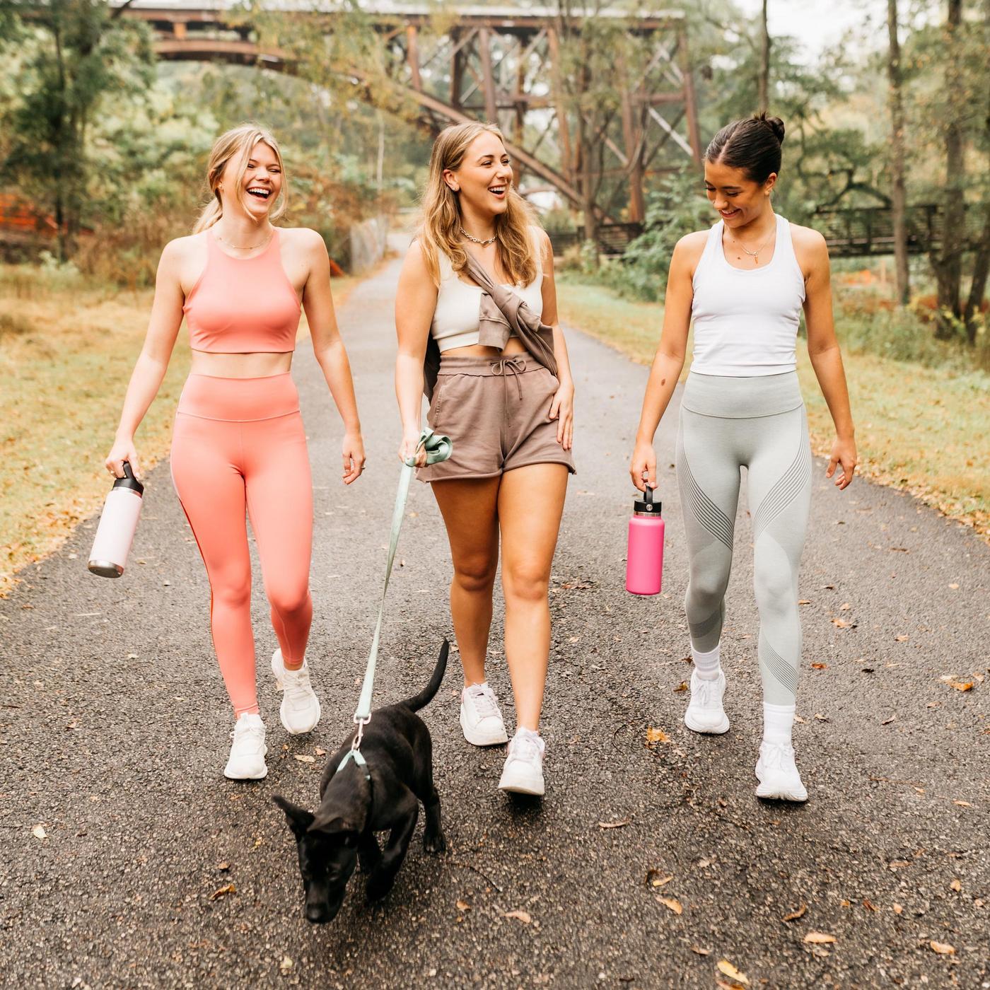 three friends walking together at UGA in Athens