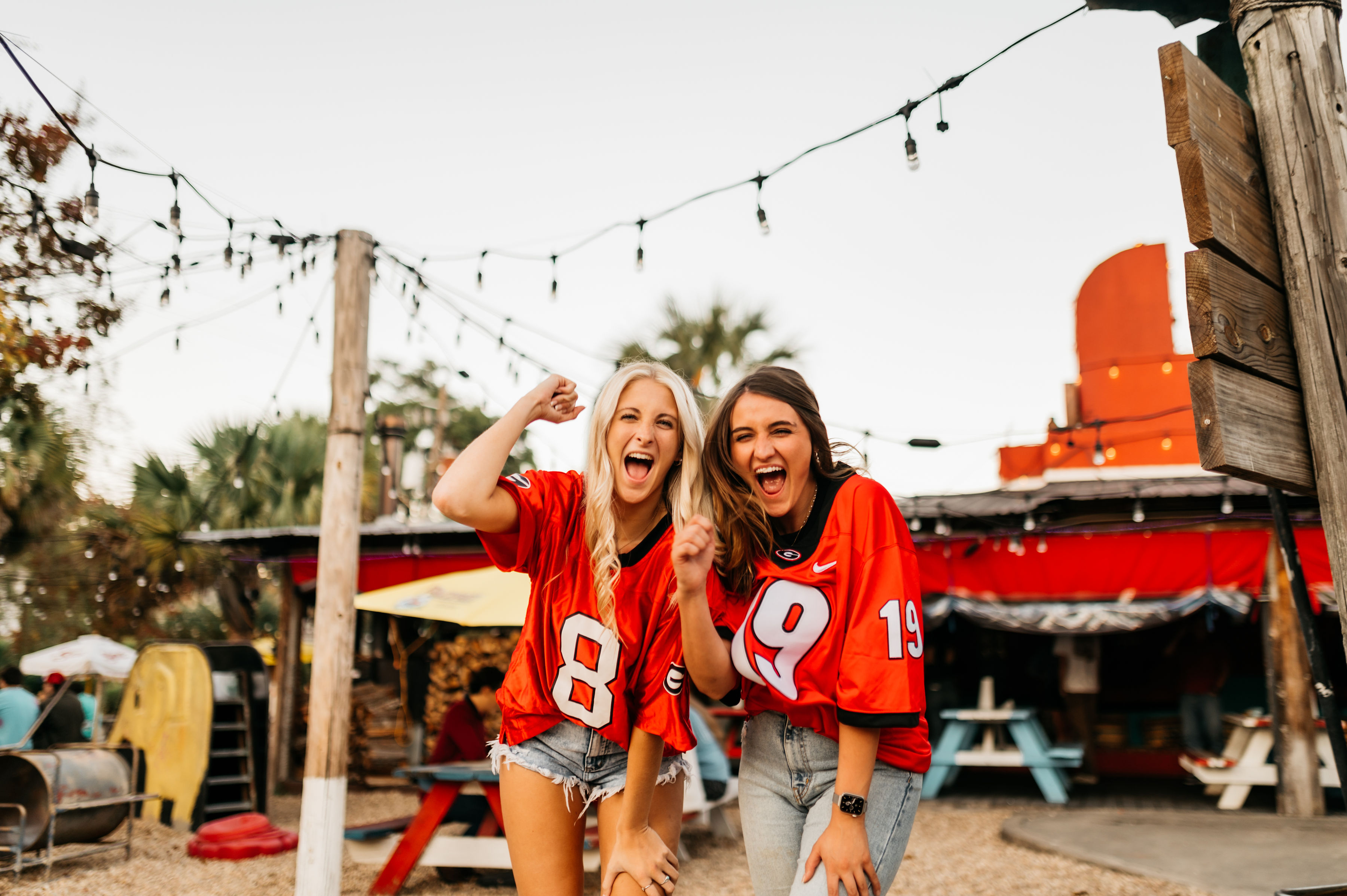 Friends at a UGA tailgate at Cali N Tito's on a game day in Athens, GA