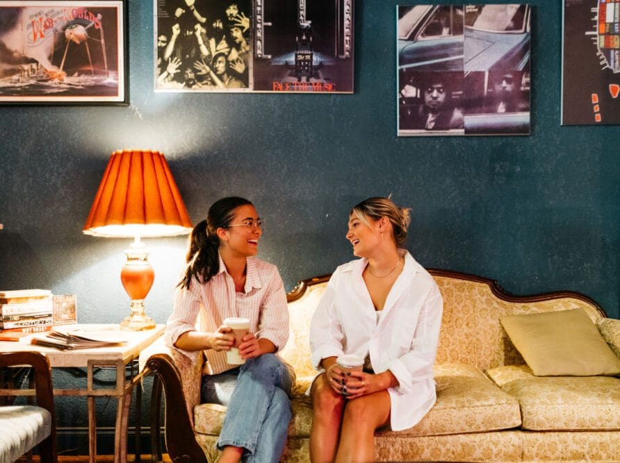 Two girls who attend UGA in Athens Coffee shop.