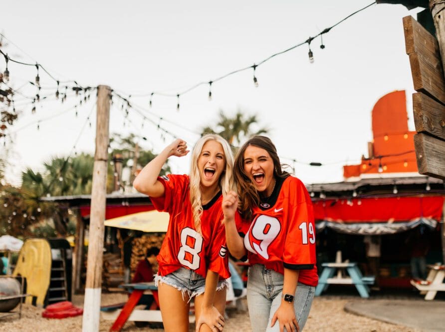 Friends at a UGA tailgate at Cali N Tito's on a game day in Athens, GA