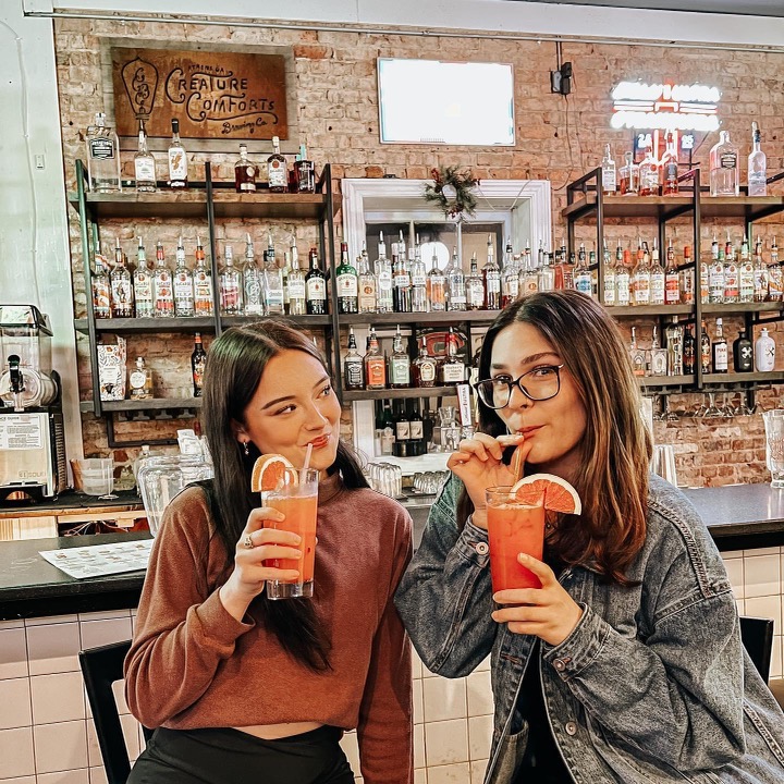 friends enjoying happy hour at Clarke's Collective in Athens 