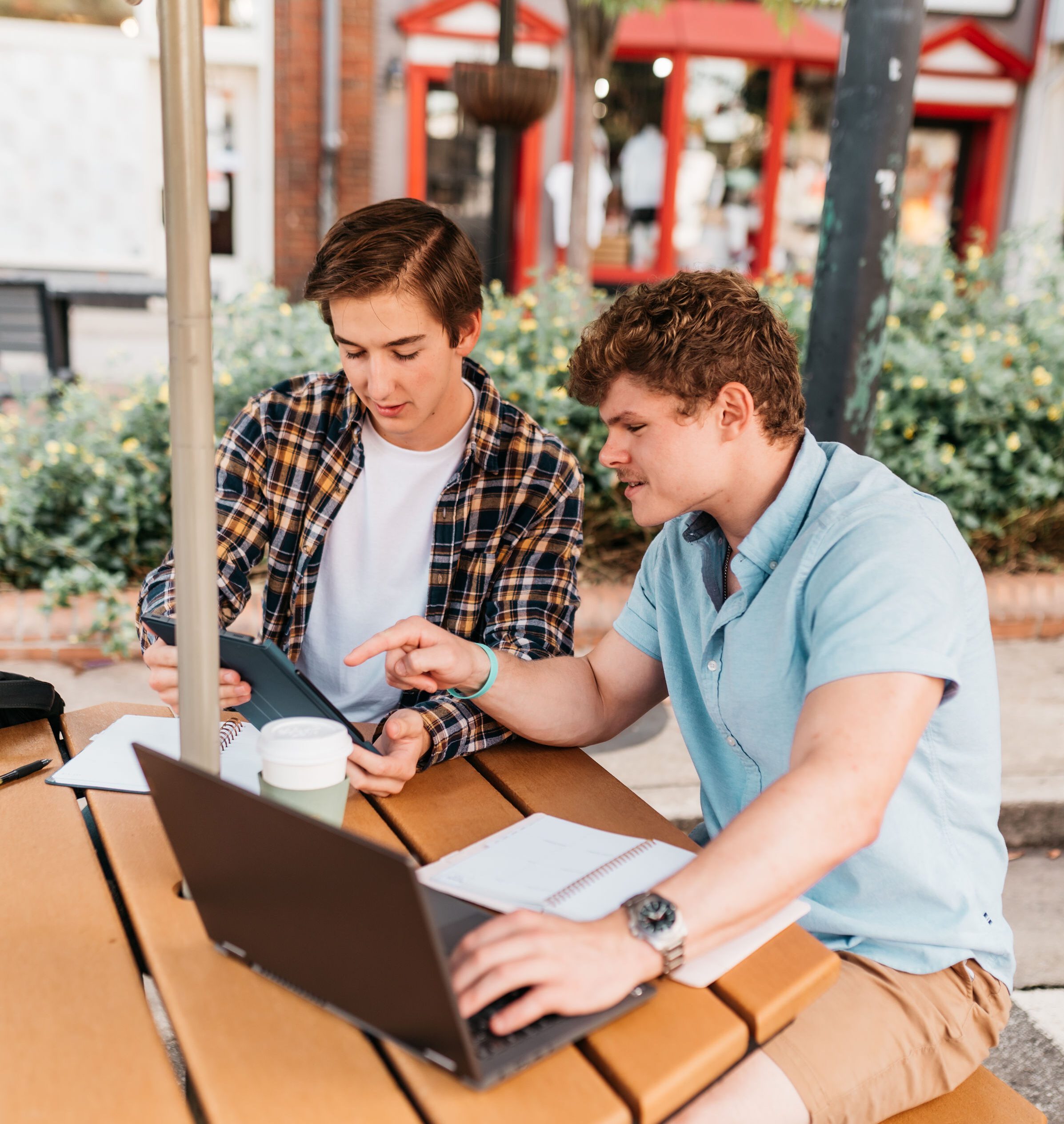 friends sitting outside studying together in athens, ga 