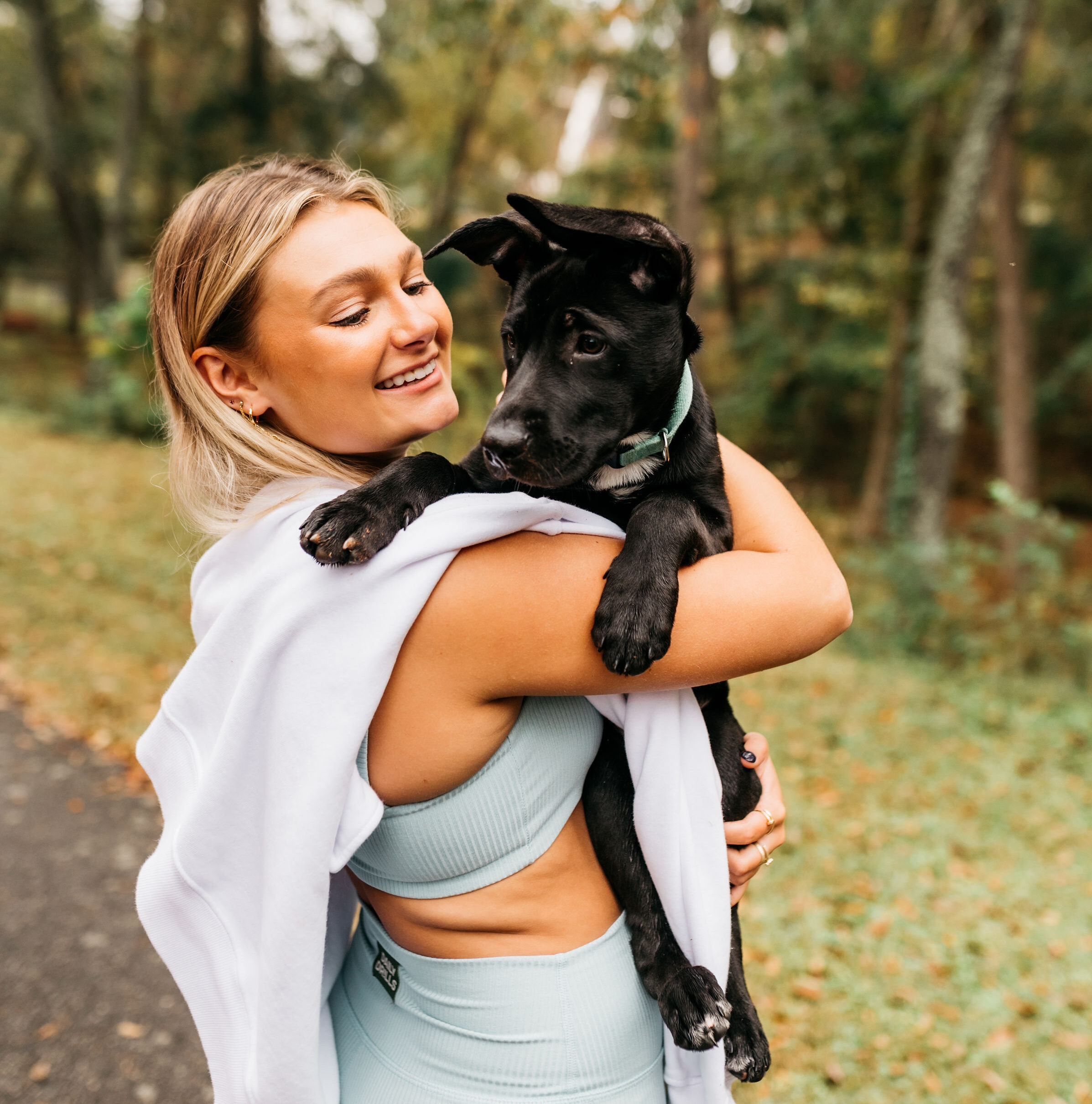 girl holding dog in athens, ga