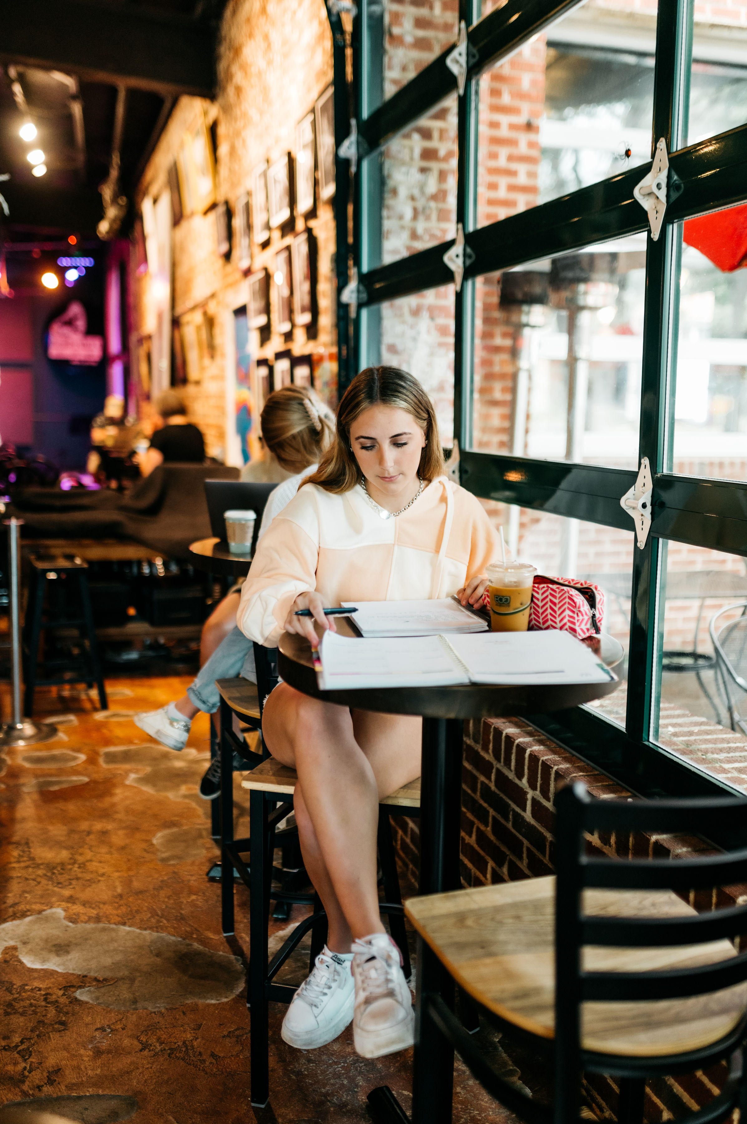 a girl signing a lease in Athens