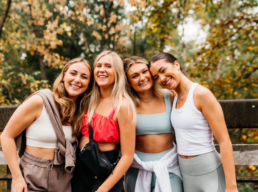 friends smiling for a photo in Athens GA