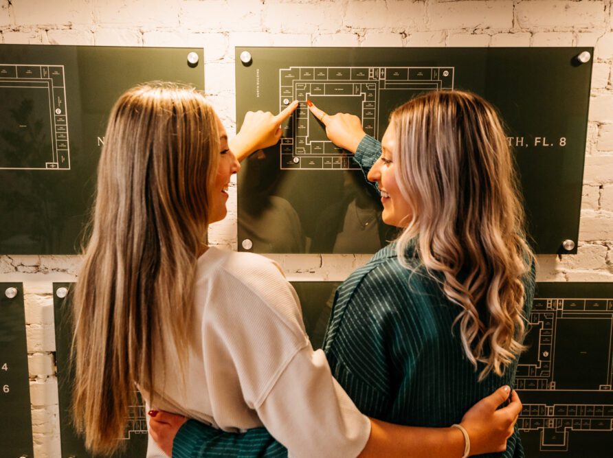 friends signing lease at rambler 