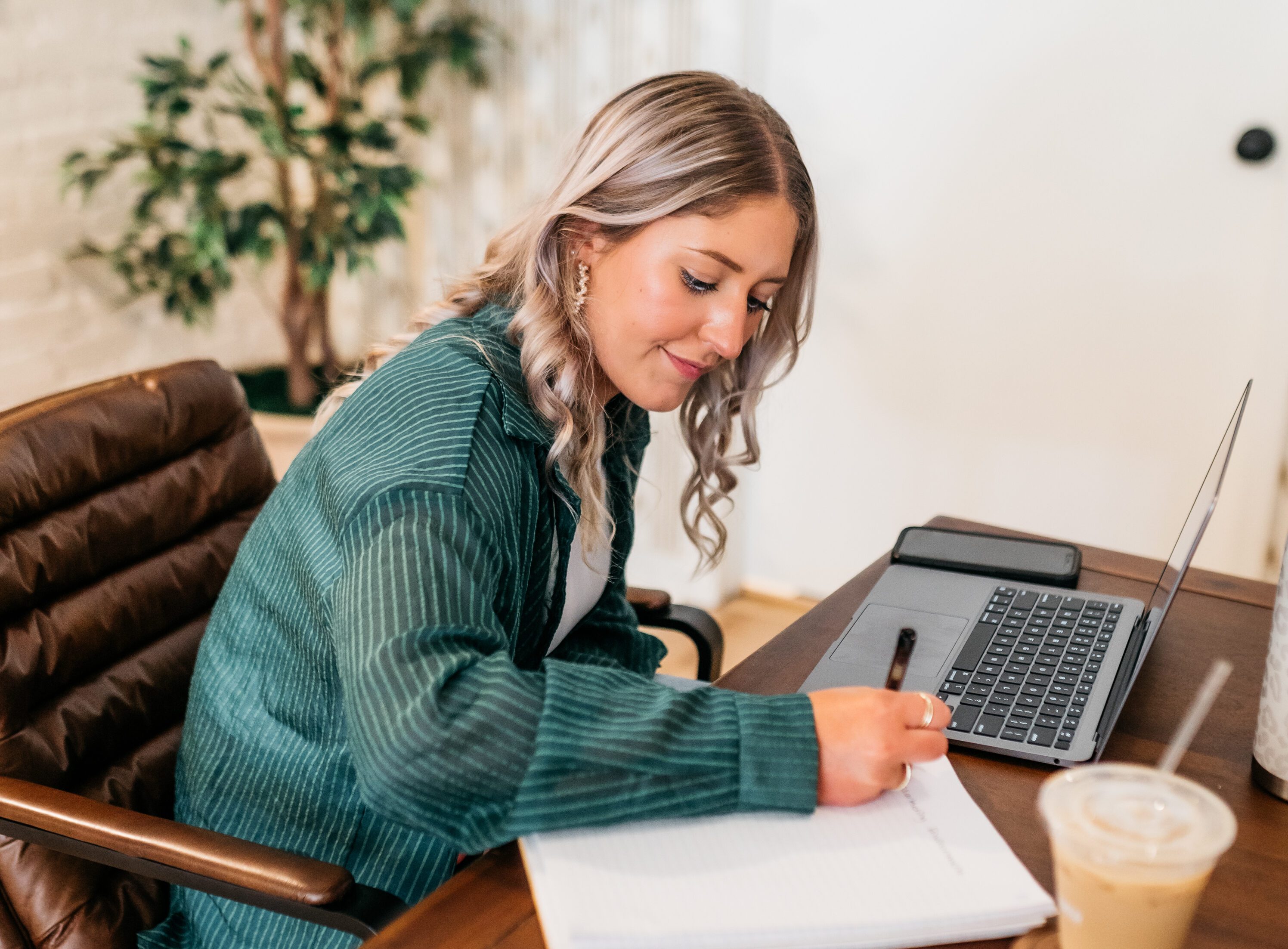 Girl signing a lease at Rambler Athens