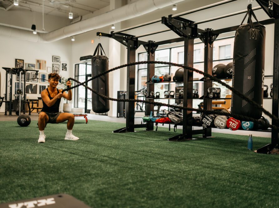 student working out with ropes in Rambler athens gym